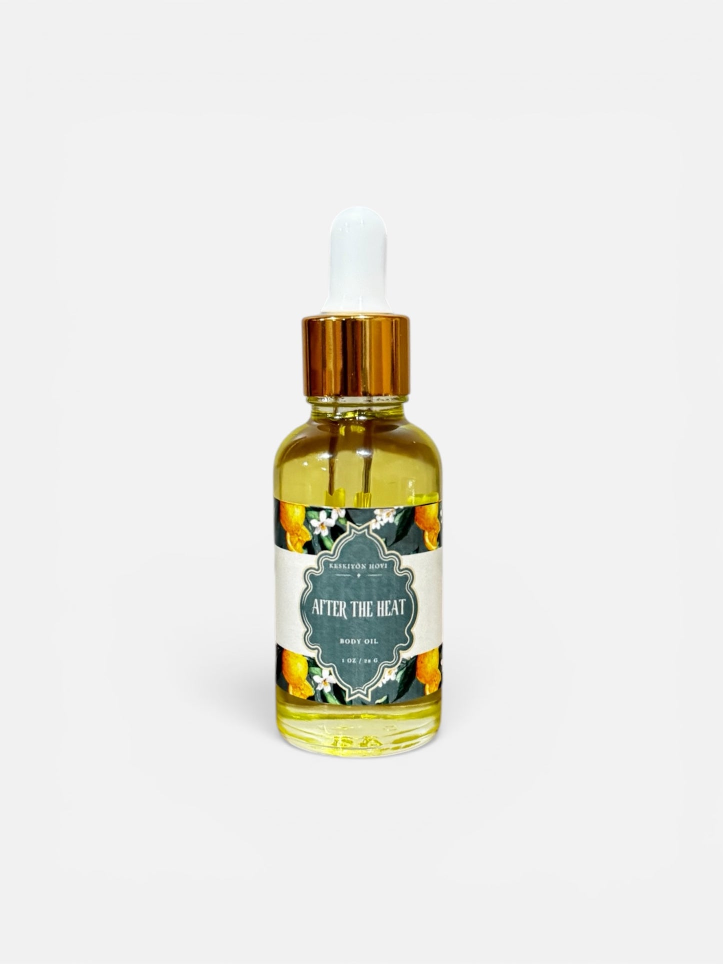 Bottle of 'After the Heat' perfume with a gold cap on a white background