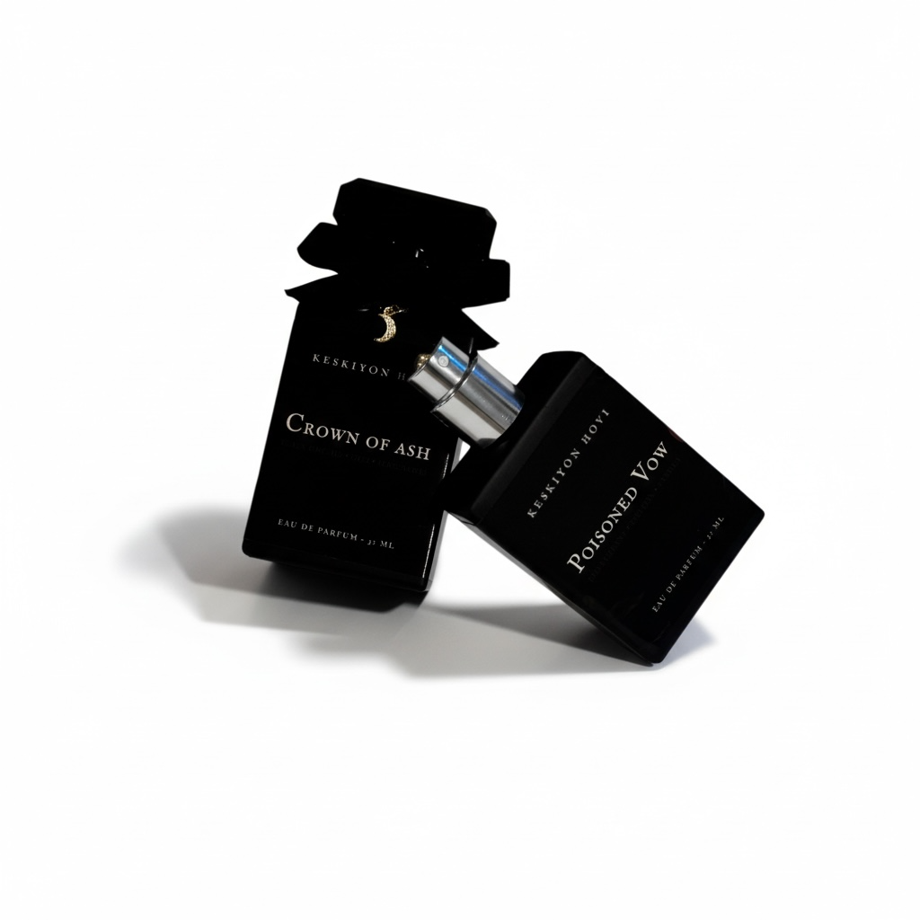 Two black perfume bottles with visible labels on a white background