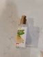 Small bottle with a gold cap on a marble surface