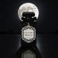 Perfume bottle labeled 'Lune de Minuit' with a full moon in the background