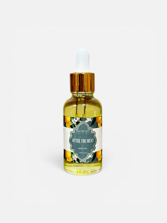 Bottle of 'After the Heat' perfume with a gold cap on a white background
