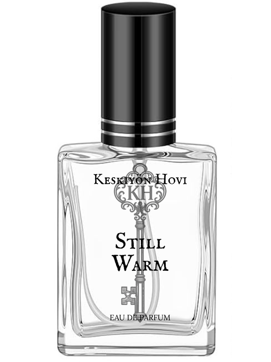 Perfume bottle labeled 'Keshyon Hovi Still Warm' on a white background